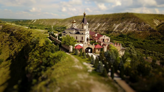 Aerial view of Orhei Vechi Monastery in Moldova in tilt-shift video
